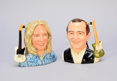 Lot 362 - A pair of Royal Doulton character jugs of Francis Rossi and Rick Parfitt
