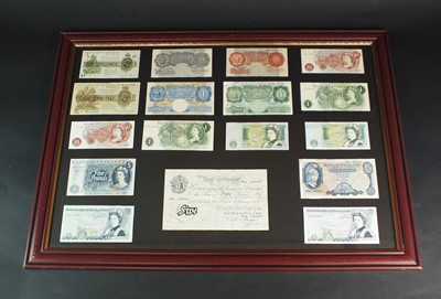 Lot 150 - A collection of seventeen United Kingdom banknotes within glazed wood frame