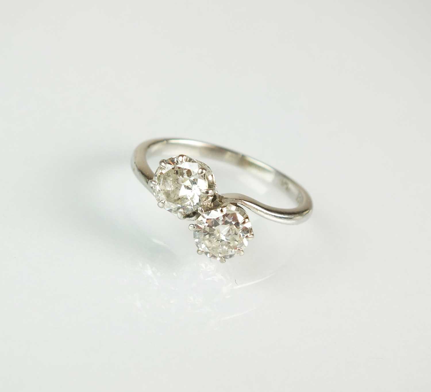 Lot 87 - A two stone diamond crossover ring