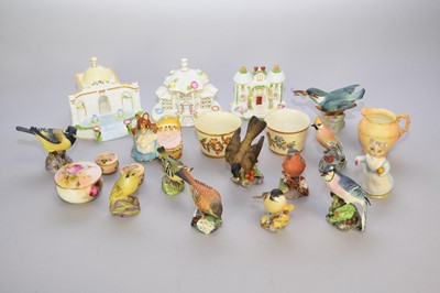 Lot 365 - A quantity of Royal Worcester ornaments and Coalport cottages