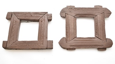 Lot 405 - Two small Tibetan carved wood window frames