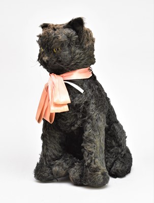 Lot 507 - An early Merrythought black mohair seated cat