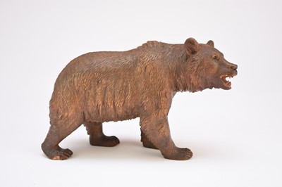 Lot 255 - A Black Forest carved wood figure of a bear