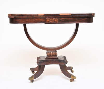 Lot 612 - A Regency style rosewood fold-over card table