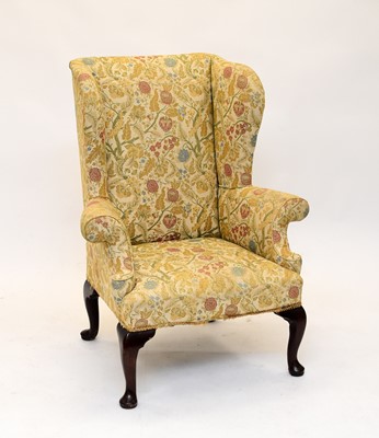 Lot 683 - An 18th century mahogany wing chair
