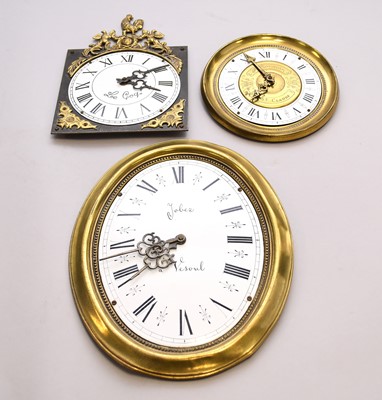Lot 32 - An early 20th century wall clock, Thomas Burtons, Hanley and three clock dials