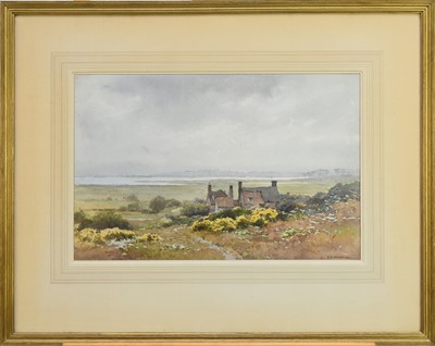 Lot 173 - Ernest William Haslehurst (1866-1949) Cottages amongst Gorse bushes, Estuary beyond
