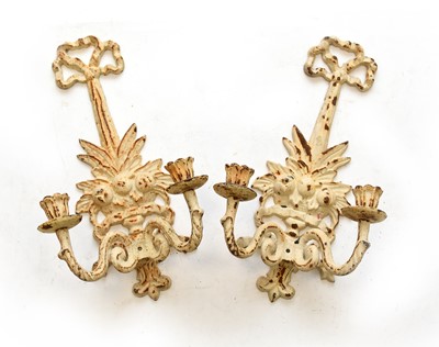 Lot 33 - A set of 4 cast iron triple branch wall sconces, plus another pair and 4 crestings (10)