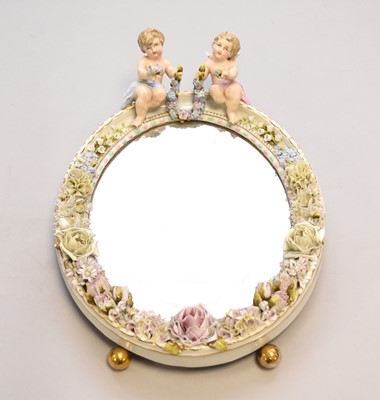 Lot 462 - A 19th century Dresden easel mirror