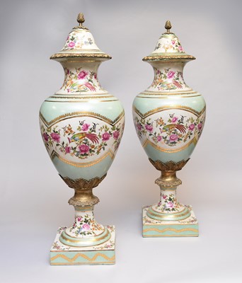 Lot 18 - A large pair of 20th century painted covered urns (4)