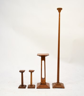 Lot 506 - A set of four inter-war period walnut hat display stands
