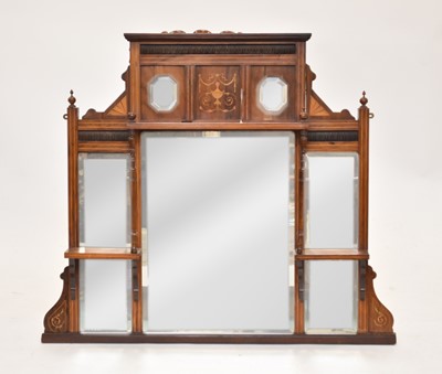 Lot 691 - An Edwardian faux rosewood inlaid overmantel mirror