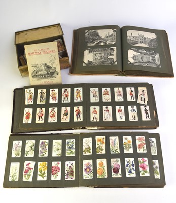 Lot 562 - A collection of cigarette cards to various albums with some loose sets