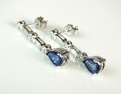Lot 46 - A pair of 18ct white gold sapphire and diamond ear pendants