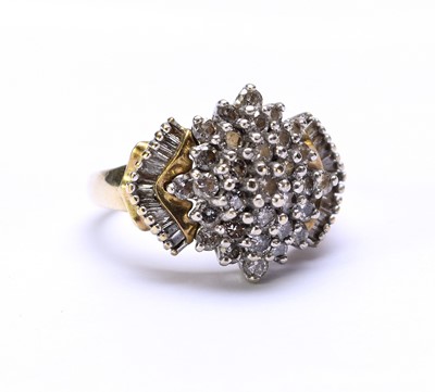Lot 99 - A diamond set dress ring