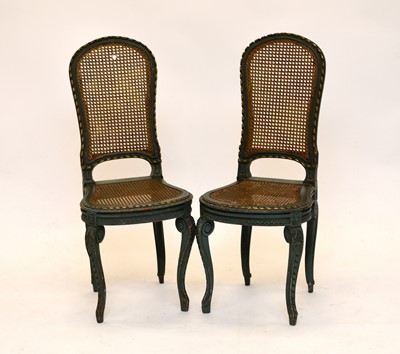 Lot 614 - A pair of early 20th century, Louis XV style, painted, caned chairs