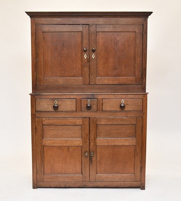 Lot 80 - An early 19th century oak press cupboard