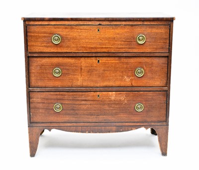 Lot 616 - An early 19th century rectangular mahogany chest of three long drawers