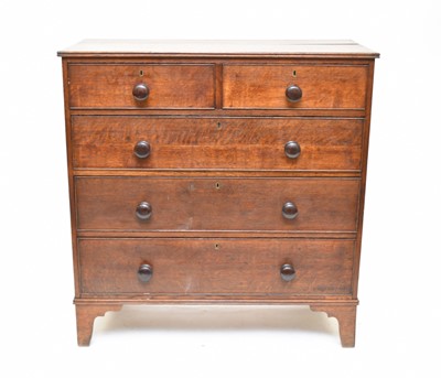 Lot 67 - An early 19th century oak chest of two short and three long drawers