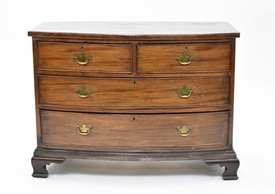 Lot 615 - An early 19th century mahogany veneered bow-fronted chest of drawers
