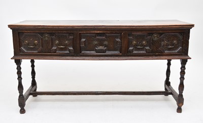 Lot 579 - A 17th century oak geometric dresser base