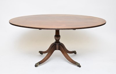 Lot 580 - A reproduction mahogany breakfast table and a set of six mahogany dining chairs