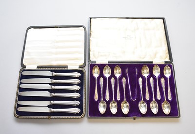 Lot 60 - A cased set of silver teaspoons and a cased silver of silver handled knives