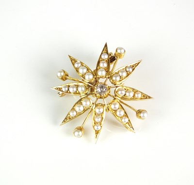 Lot 81 - A diamond and pearl brooch/pendant