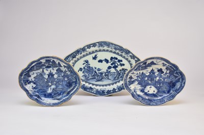 Lot 50 - A pair of Chinese blue and white oval dishes and another, 18th century