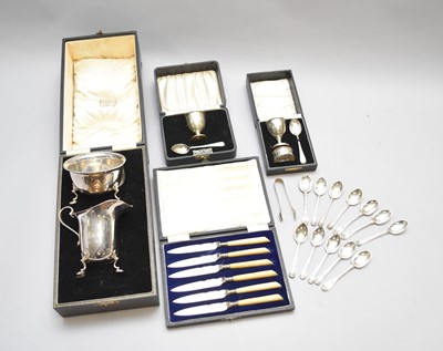 Lot 99 - A small collection of cased silver and plate