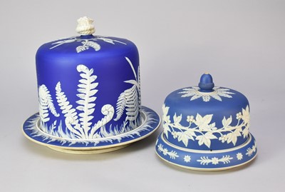 Lot 346 - Two Staffordshire blue and white jasperware cheese domes