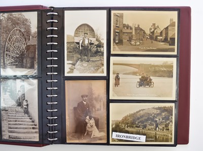 Lot 1027 - SHROPSHIRE POSTCARDS,  A album of 90 RP postcards