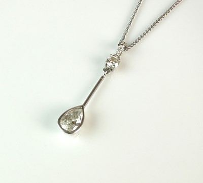 Lot 66 - An 18ct white gold pear cut diamond pendant