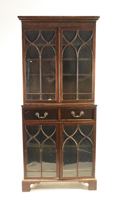Lot 589 - An early 20th century, Gothic style bookcase