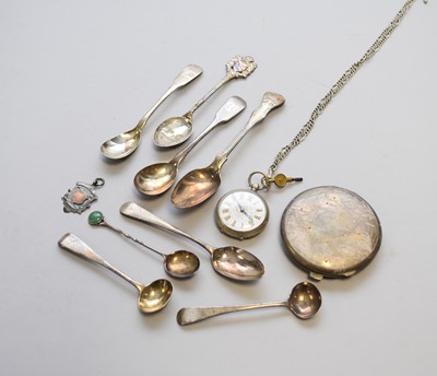 Lot 109 - A collection of silver spoons, a white metal compact and silver watch