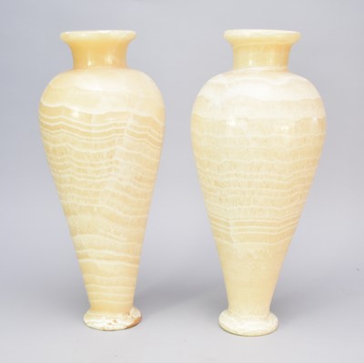 Lot 526 - A pair of polished alabaster amphora vases