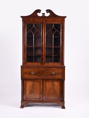 Lot 239 - A late Regency, figured mahogany, secretaire bookcase