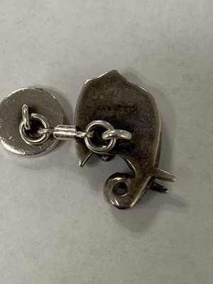 Lot 50 - A pair of Asprey silver and enamel elephant cufflinks