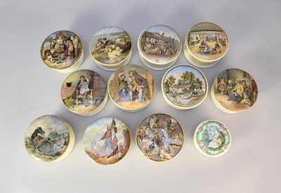 Lot 355 - A collection of prattware pot lids with bases