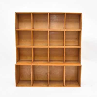 Lot 573 - Four Unix light oak modular box shelf units