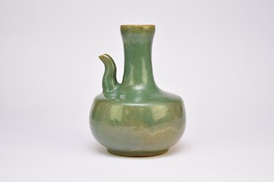 Lot 57 - A Chinese celadon glazed stoneware ewer