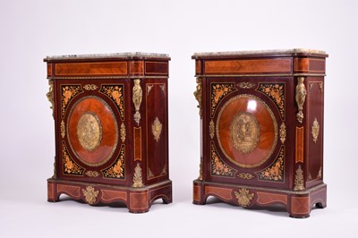 Lot 227 - A pair of Louis XVI style inlaid mahogany pier cabinets