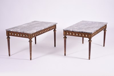 Lot 676 - A pair of Valencia Louis XVI style mahogany low tables