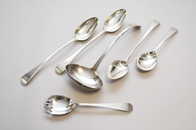 Lot 59 - Three George III silver basting spoons, a plated soup ladle and a pair of plated salad servers