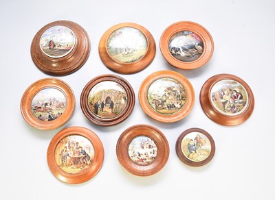 Lot 348 - A group of framed prattware pot lids