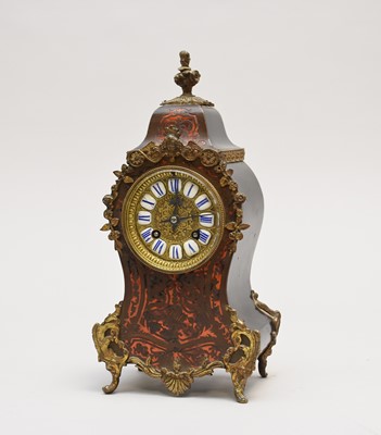 Lot 550 - An early 20th century Buhl-style, Louis XV style, mantel clock, by ‘Marti’
