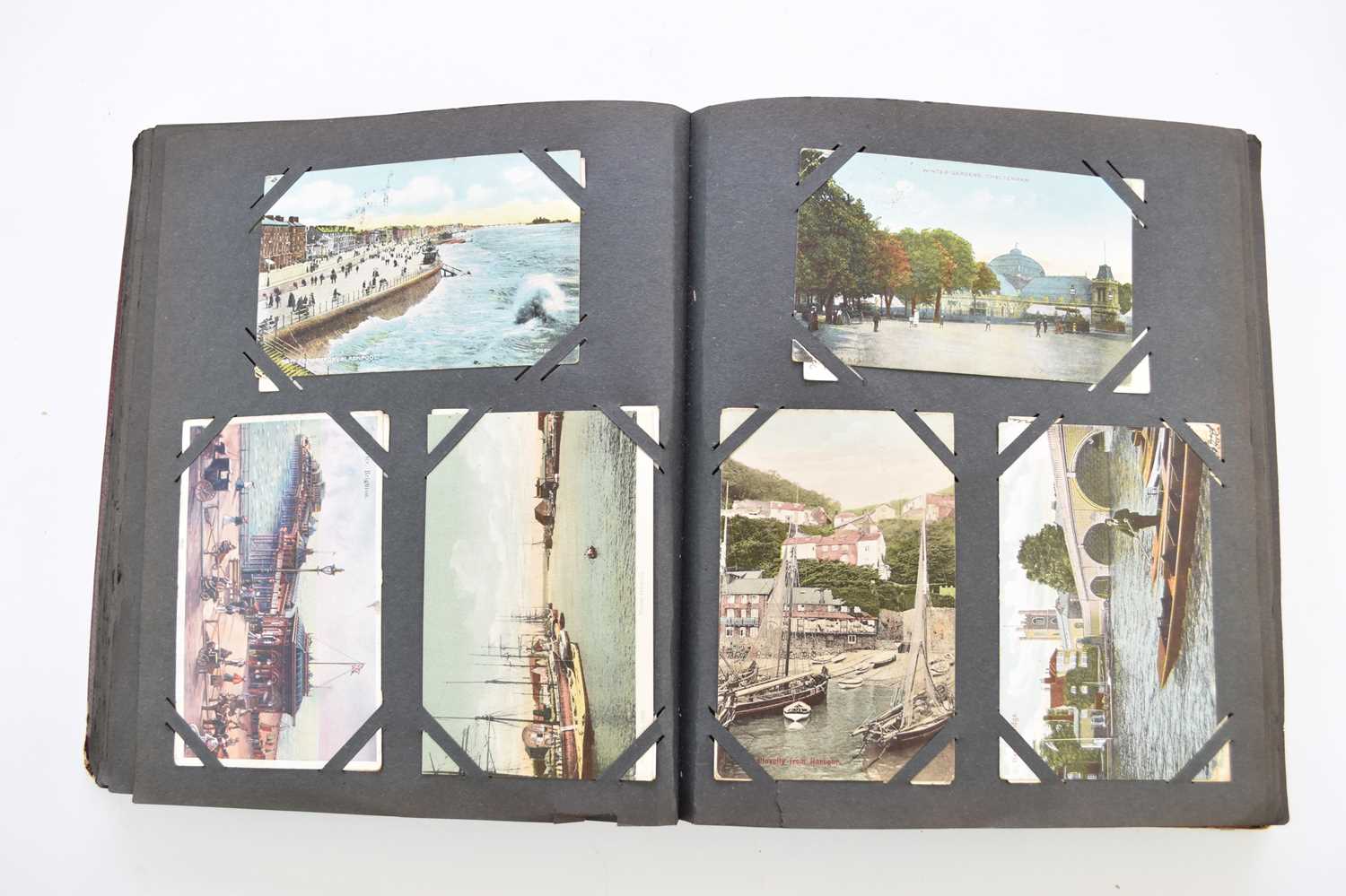 Lot 1061 - TWO POSTCARD ALBUMS with 3 family photo albums, early 20th century