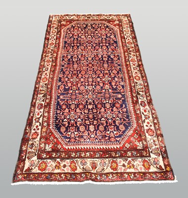 Lot 636 - A Persian Sarouk runner