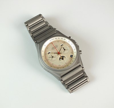 Lot 94 - A Zenith Titanium triple calendar chronograph bracelet wristwatch with moon phases