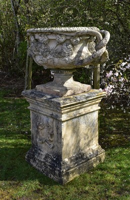 Lot 49 - A large and impressive 19th century ceramic urn, modelled as the Warwick vase, on a pedestal (2)